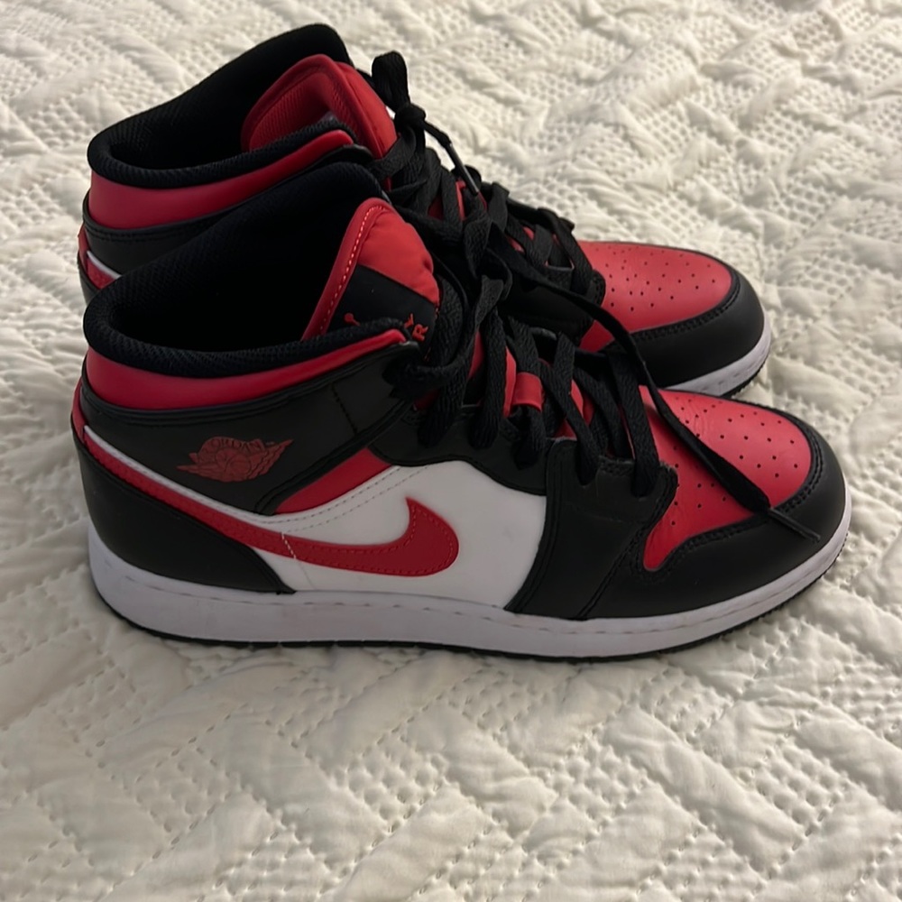 Size 7Y red/black Jordans, worn twice, like new